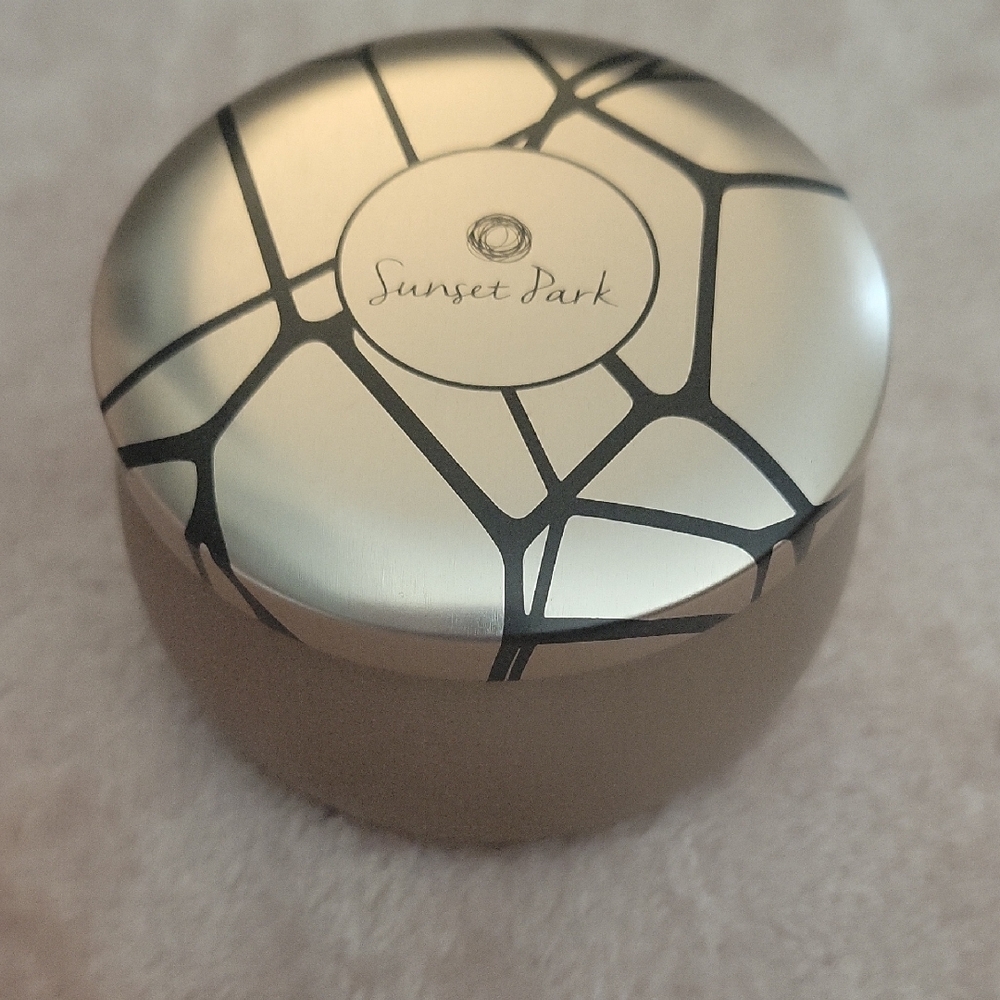 Elegant Silver Candle with Warning Label